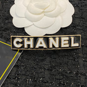 CHANEL 26S CHANEL LOGO LETTER ENAMEL BAR HAIR CLIP IN BLACK ENAMEL AND GOLD METAL 629926