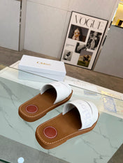 CHLOÉ WOODY MULE IN WHITE LAMBSKIN WITH EMBROIDERED LOGO