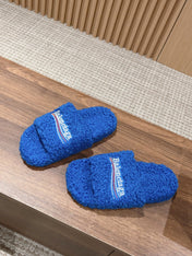 FURRY SLIDES IN COBALT BLUE CURLY SHEARLING