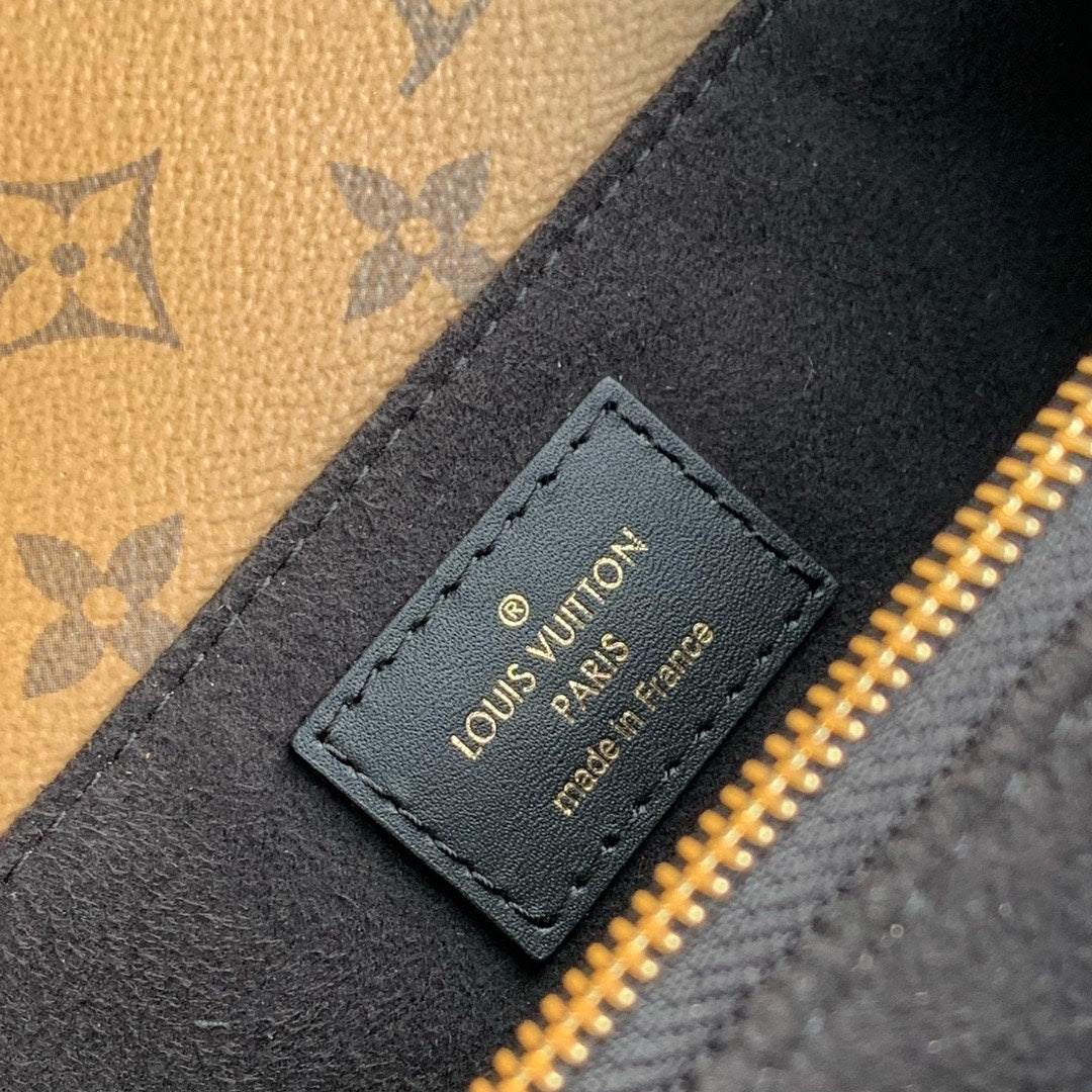 POCHETTE MÉTIS EAST WEST 21.5 IN BROWN MONOGRAM COATED CANVAS AND CALFSKIN