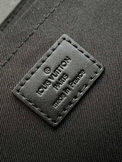 S-CAPE MESSENGER BAG 28 IN BLACK MONOGRAM ECLIPSE CANVAS
