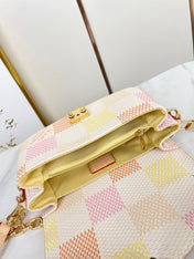 POCHETTE MÉTIS EAST WEST 21 IN PEACH DAMIER GIANT CANVAS GOLD HARDWARE
