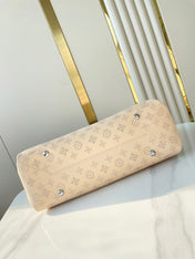 HAND IT ALL MM 32 IN CREAM MONOGRAM PERFORATE CALFSKIN SILVER HARDWARE
