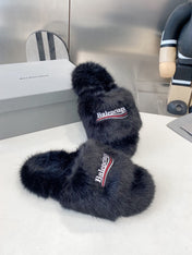 BALENCIAGA 25S FUR SLIPPERS IN BLACK FAUX SHEARLING
