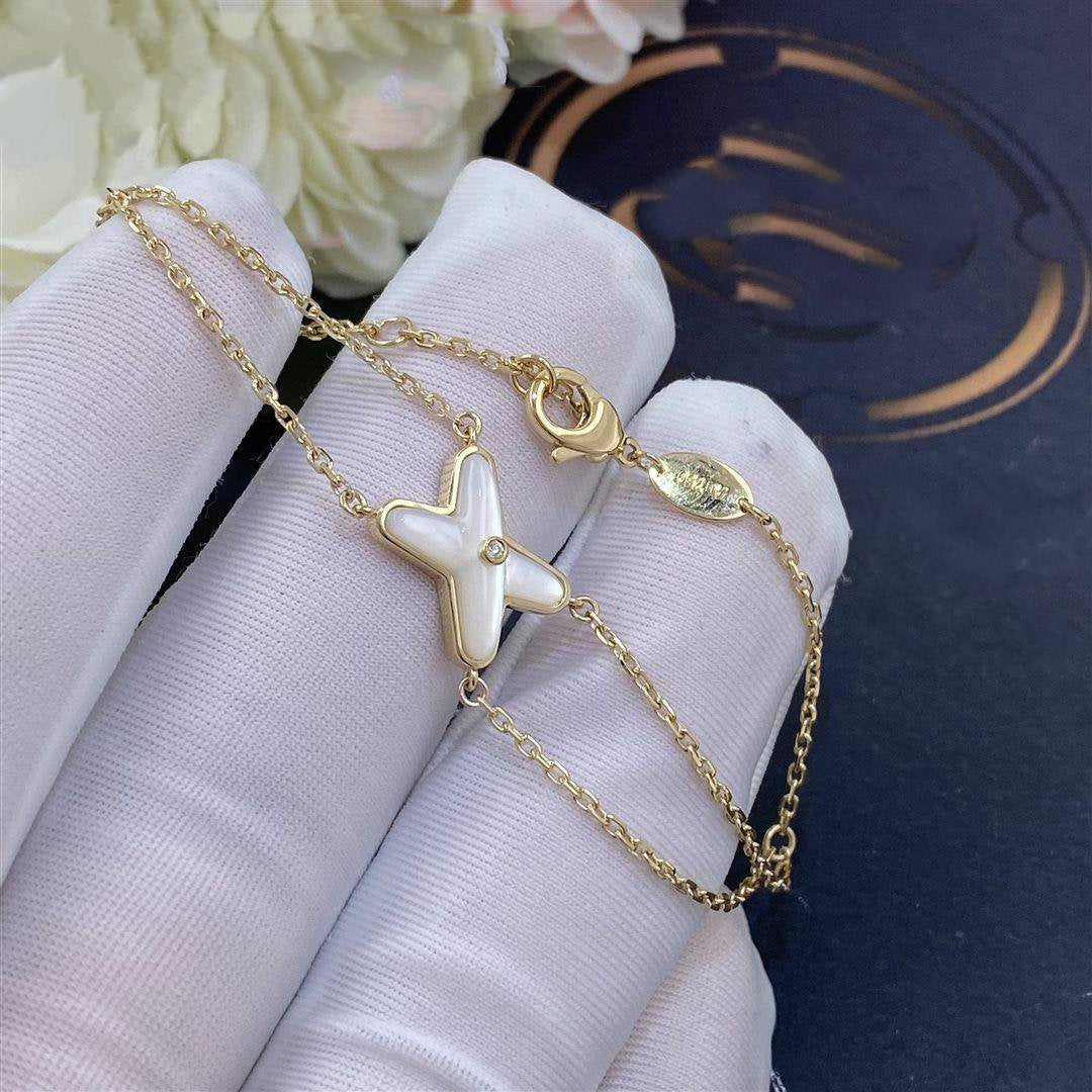 chaumet-jeux-de-liens-bracelet-yellow-gold-mother-of-pearl-diamond-CORAL-1_7b8e65b4-f624-413d-add4-b482483e015d.jpg