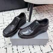 PRADA 26S SNEAKERS IN BLACK SHINY CALFSKIN
