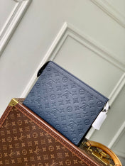 POCHETTE VOYAGE 27 IN DARK BLUE MONOGRAM ECLIPSE CALFSKIN EMBOSSED LOGO