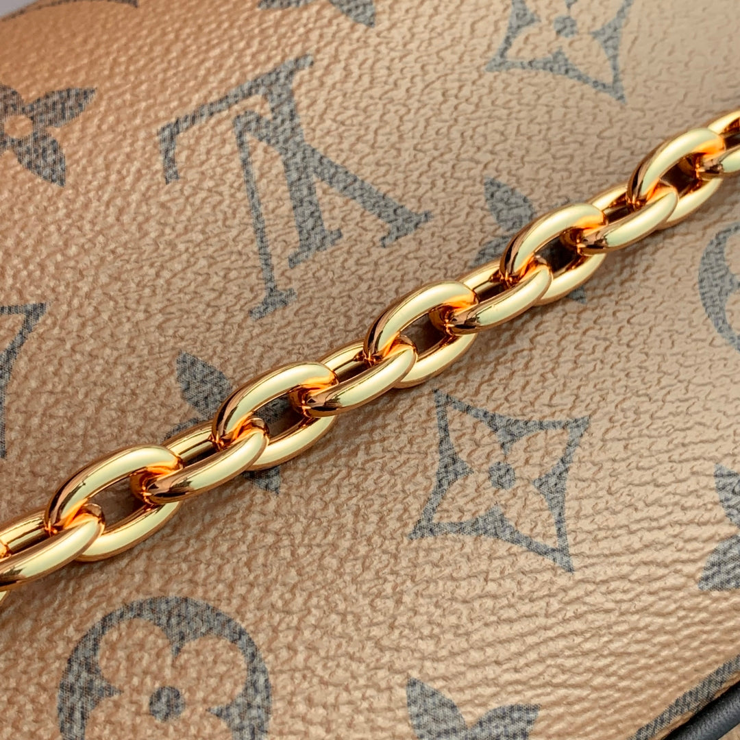 WALLET ON CHAIN IVY 23 IN BROWN MONOGRAM REVERSE CANVAS