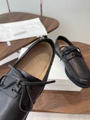 THE ROW 26S LOAFERS IN BLACK CALFSKIN