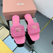 MATELASSÉ SLIDES IN PINK CALFSKIN