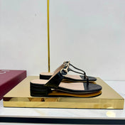 THONG SANDALS IN BLACK LAMBSKIN PRINTED LOGO WITH GOLD HARDWARE
