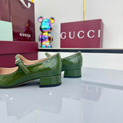 GG MARY JANE 25S IN MOSS GREEN LAMBSKIN WITH BOW