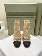 CHANEL 25S CALF-LENGTH BOOTS 45MM IN BEIGE AND BLACK CALFSKIN GOLD HARDWARE