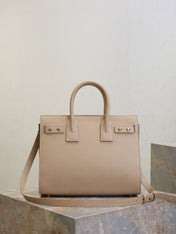 YSL 25S SAC DE JOUR GM 32 IN DARK BEIGE SUPPLE GRAINED CALFSKIN