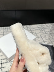CROSS STRAP SLIPPER IN WHITE SHEARLING