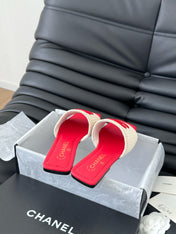 WOVEN SLIDE IN RAFFIA AND RUBY RED LAMBSKIN