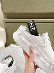 THICK-SOLED ELASTIC BACKLESS SHOES WHITE SHINY CALFSKIN