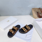 THE ROW 26S DOUBLE STRAP SLIDE SANDALS IN LEOPARD PRINT CALF HAIRCALFSKIN