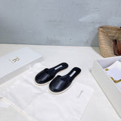 THE ROW 26S ROUND TOE MULE FLATS IN BLACK SMOOTH CALFSKIN