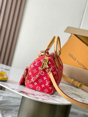 SPEEDY P9 BANDOULIÈRE 25 IN RED MONOGRAM CANVAS GOLD HARDWARE