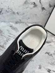 RETRO SNEAKERS IN BLACK LAMBSKIN WITH KNITTED PATTERN