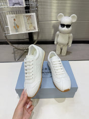 PRADA 26S LACE UP SNEAKERS IN WHITE CALFSKIN