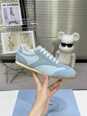 PRADA 26S LACE UP SNEAKERS IN LIGHT BLUE NYLON AND SUEDE