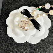 CHANEL 26S DOUBLE C LOGO MULTICOLOR GEMSTONE PEARL CHAIN BRACELET WITH CRYSTAL PENDANT IN GOLD METAL 629888