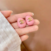 CHANEL 26S DOUBLE C LOGO OVAL STUD EARRINGS IN PINK MARBLE ENAMEL WITH GOLD METAL 631907