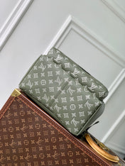 DISCOVERY PM BACKPACK 38 IN OLIVE GREEN MONOGRAM LAMBSKIN