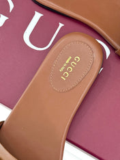 SLIDE SANDALS IN BROWN CALFSKIN WITH GOLD HARDWARE