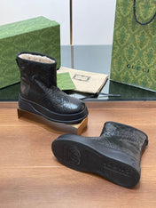 GG UGG BOOTS IN BLACK EMBOSSED DEERSKIN AND BEIGE WOOL LINING