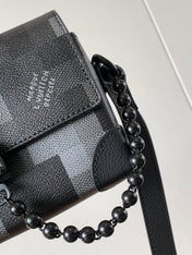 LV 25S STEAMER BAG 18 IN DAMOFLAGE BLACK CANVAS