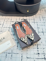 ALAIA FLAT SLINGBACK IN BLACK MIX WHITE PATENT CALFSKIN AND FILM