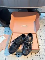 MIUMIU 26S LACE UP SNEAKERS IN BLACK CALFSKIN BUCKLE STRAP DETAIL