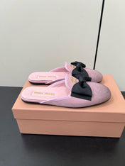 BOW MULES IN DUST PINK SUEDE