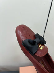 LOAFERS WITH BOW IN RED BROWN SHEEPSKIN
