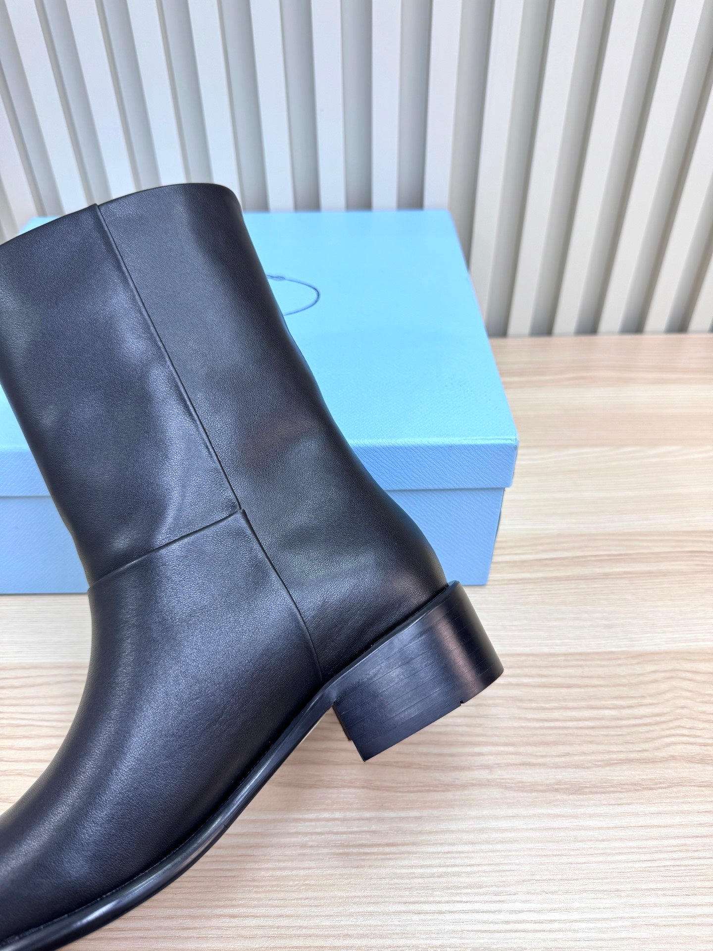 PRADA 25S LOW-CUT BOOTS IN BLACK LAMBSKIN