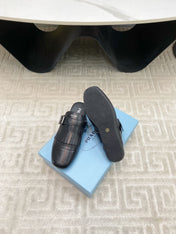 TASSEL MULES IN BLACK LAMBSKIN