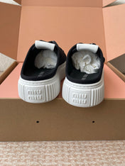 WASH SNEAKER MULES IN BLACK DENIM