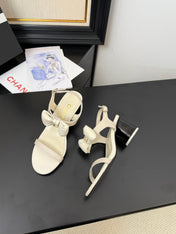MID HEEL SANDALS IN WHITE CALFSKIN WITH BOW