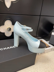 FLATFORM SANDAL IN LIGHT BLUE CALFSKIN AND BLACK FABRIC