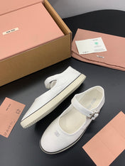 MIUMIU 26S MARY JANE FLATS IN WHITE CANVAS LOGO