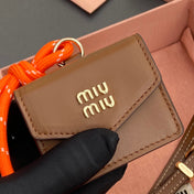 MICRO BAG 7 IN TAWNY BROWN SMOOTH LAMBSKIN ORANGE STRAP