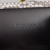 KNOT CHAIN CLUTCH 20.5 IN SNAKE PATTERN CALFSKIN