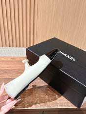CHANEL 25S BALLET MARY JANES BLACK AND IVORY IN CALFSKIN