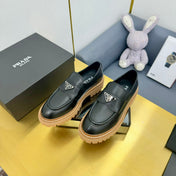 LOAFER WITH TRIANGLE LOGO IN BLACK CALFSKIN
