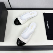 BOW MULE IN WHITE FUR AND BLACK CALFSKIN