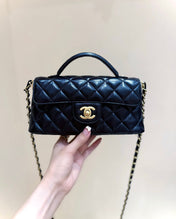 QUILTED FLAP BAG WITH HANDLE 20 IN BLACK LAMBSKIN GOLD PLATED METAL