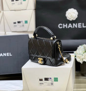 PEARL LIMITED EDITION FLAP BAG WITH HANDLE 20 IN BLACK LAMBSKIN